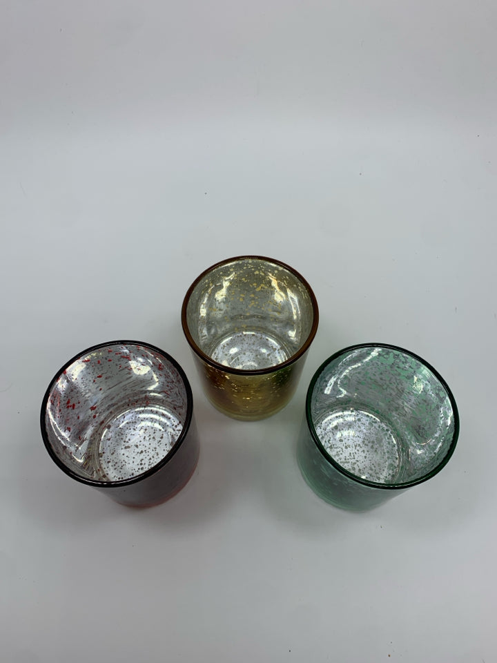 3 MULTI-COLORED SPECKLED VOTIVE HOLDERS.