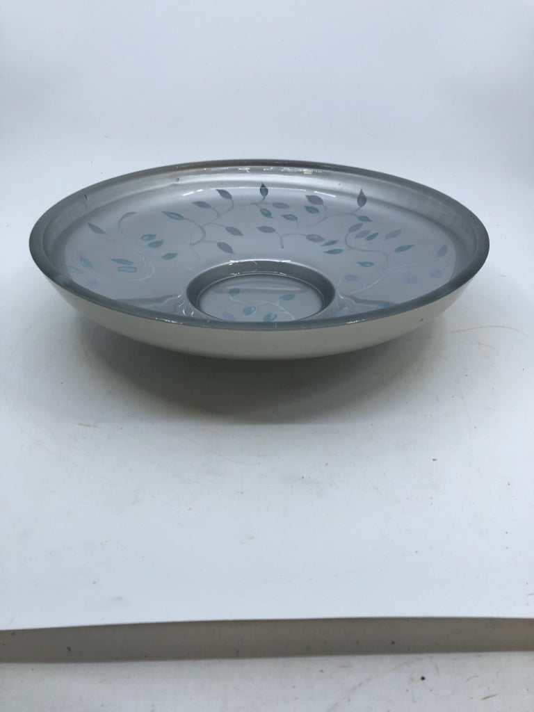 SILVER DEEP ROUND DISH CANDLE HOLDER WITH GRAY/GREEN LEAVES.