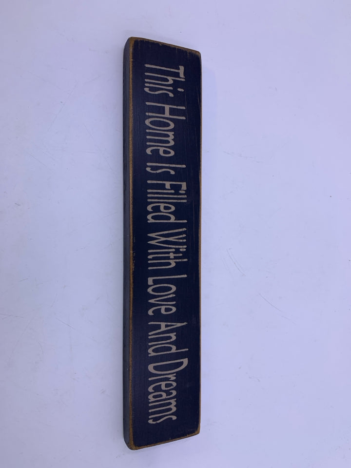 BLACK WOOD THIS HOME IS SIGN.