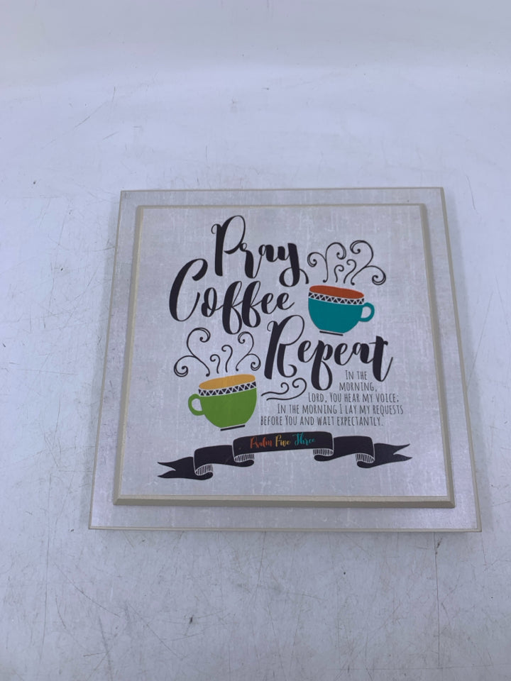 PRAY COFFEE REPEAT SQUARE WALL HANGING.