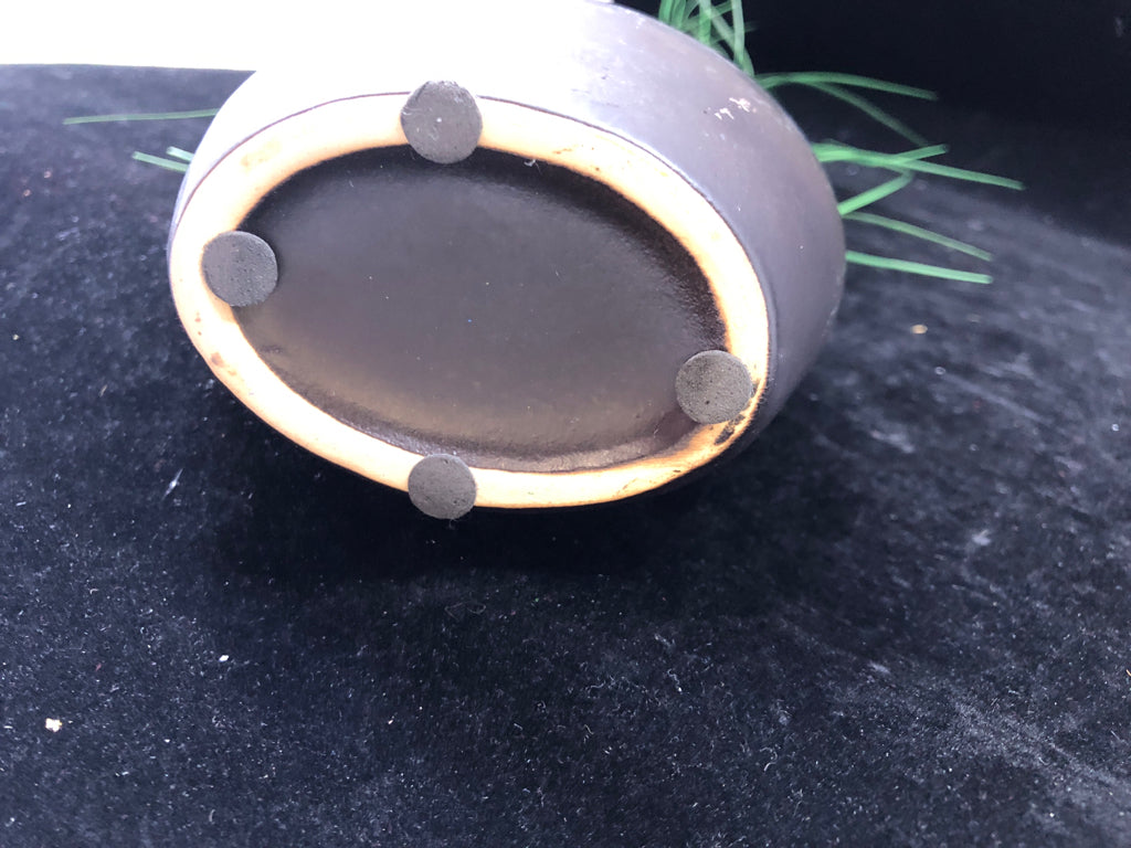 BROWN OMBRE VASE W/ TALL GREEN GRASS.