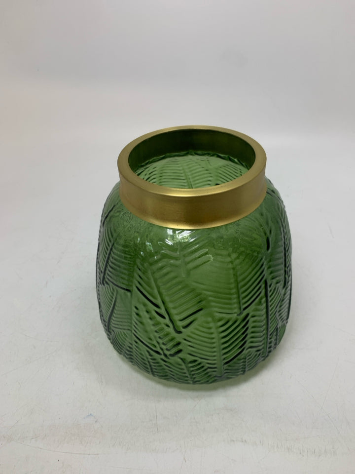 TEXTURED DARK GREEN VASE W/ GOLD METAL TOP.