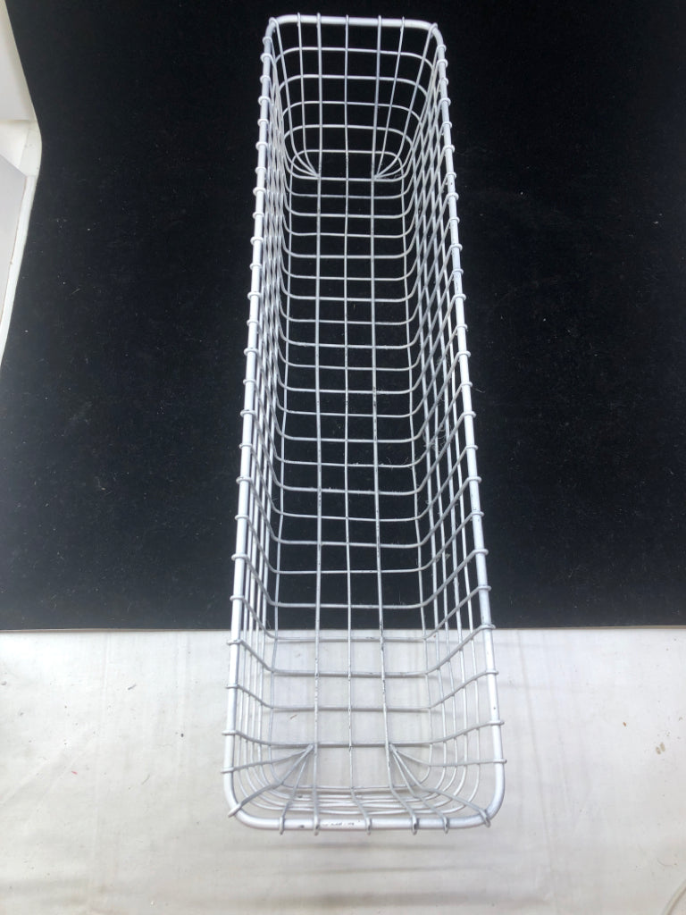 LONG WHITE METAL BASKET.