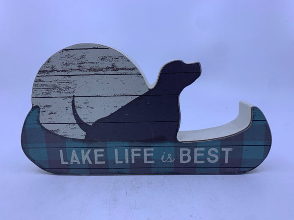 DOG ON CANOE LAKE LIFE IS BEST.
