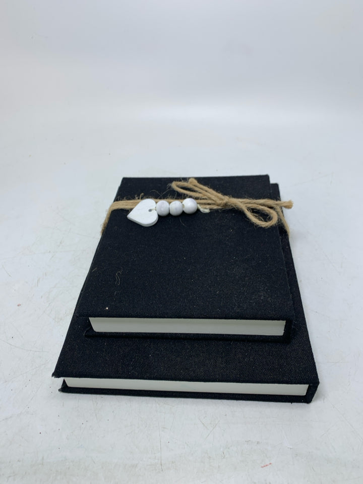 BLACK DOUBLE STACK BOOKS W/ SCRIPT.