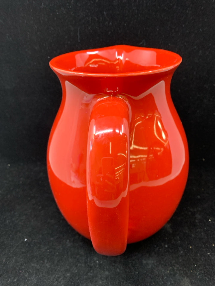 RED CERAMIC PITCHER.