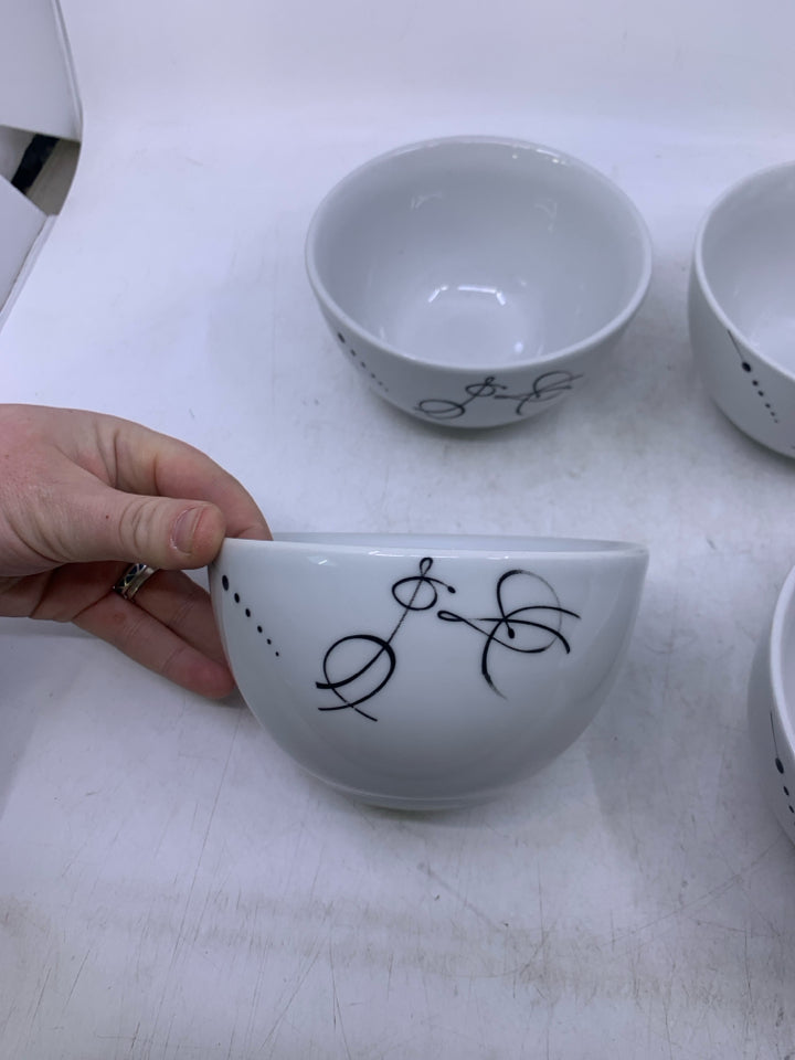 4 WHITE CEREAL BOWLS W/ BLACK DESIGNS.