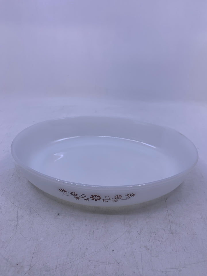 VTG WHITE GLASS OVAL BAKING DISH W/ BROWN FLOWERS.