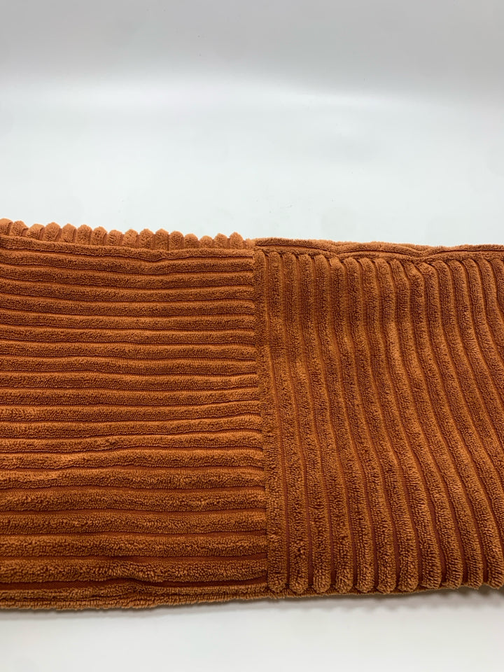 BROWN RIBBED PILLOW COVER.