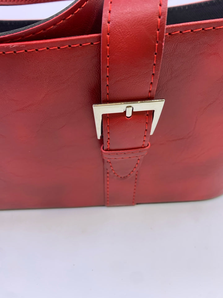 RED LEATHER FAUX PURSE BASKET W/BUCKLES.