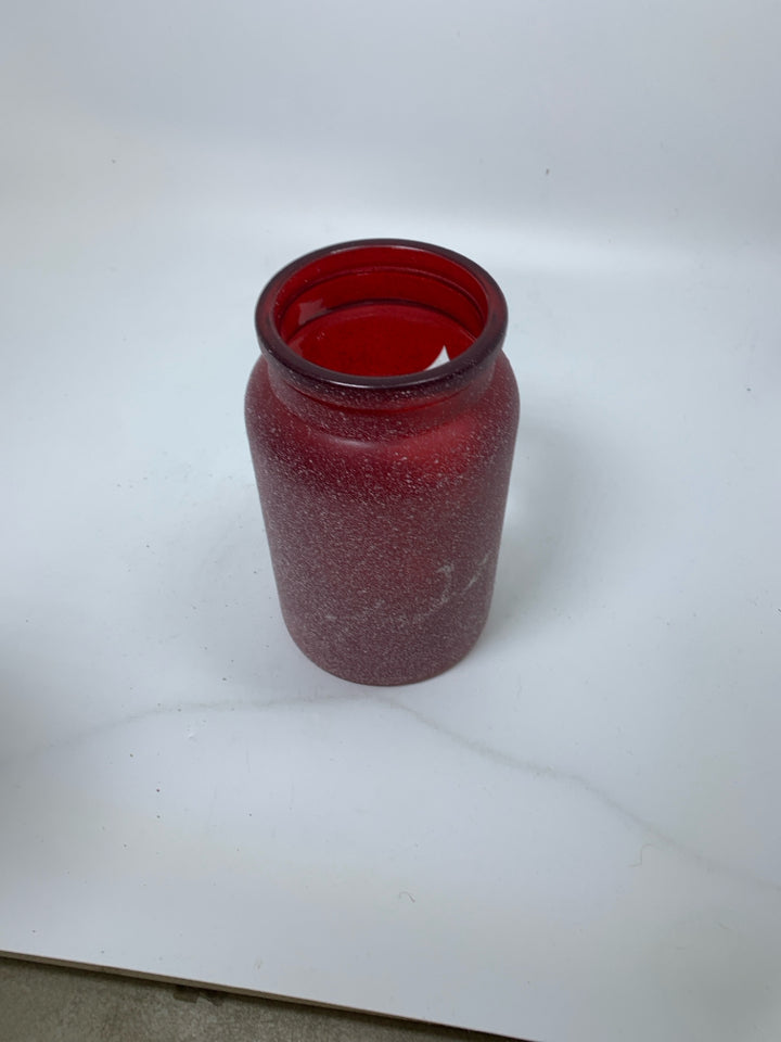 FROSTED RED CANDLE JAR W/ CHRISTMAS TREE OUTLINE.