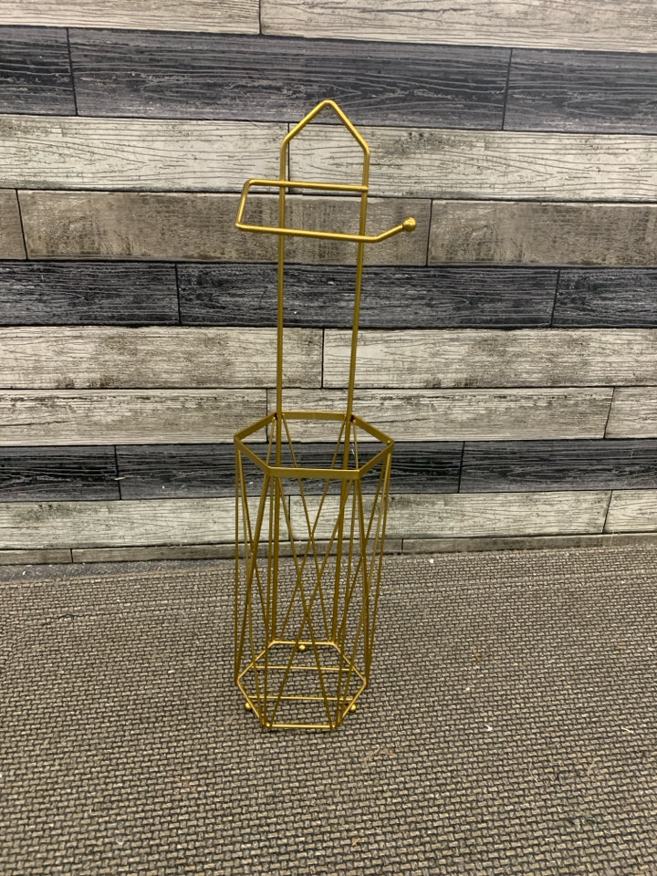 GOLD HEXAGON TOILET PAPER HOLDER.