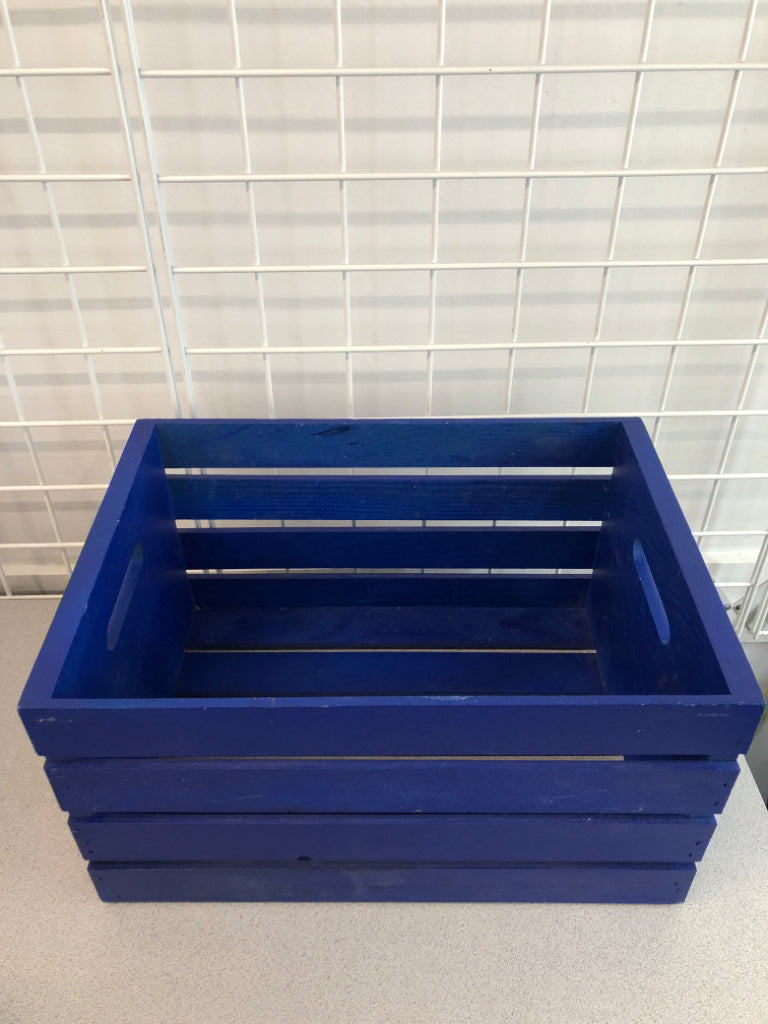 BLUE WOODEN CRATE.