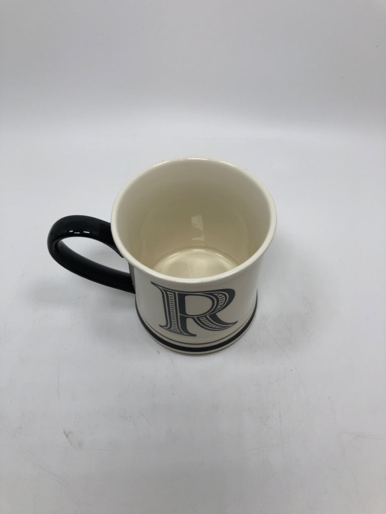 R COFFEE MUG W/BLACK HANDLE.