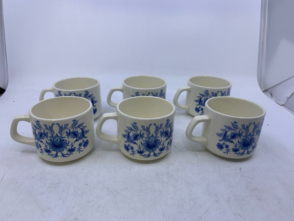 VTG 6 CREAM W/ BLUE FLORAL TEA CUPS.