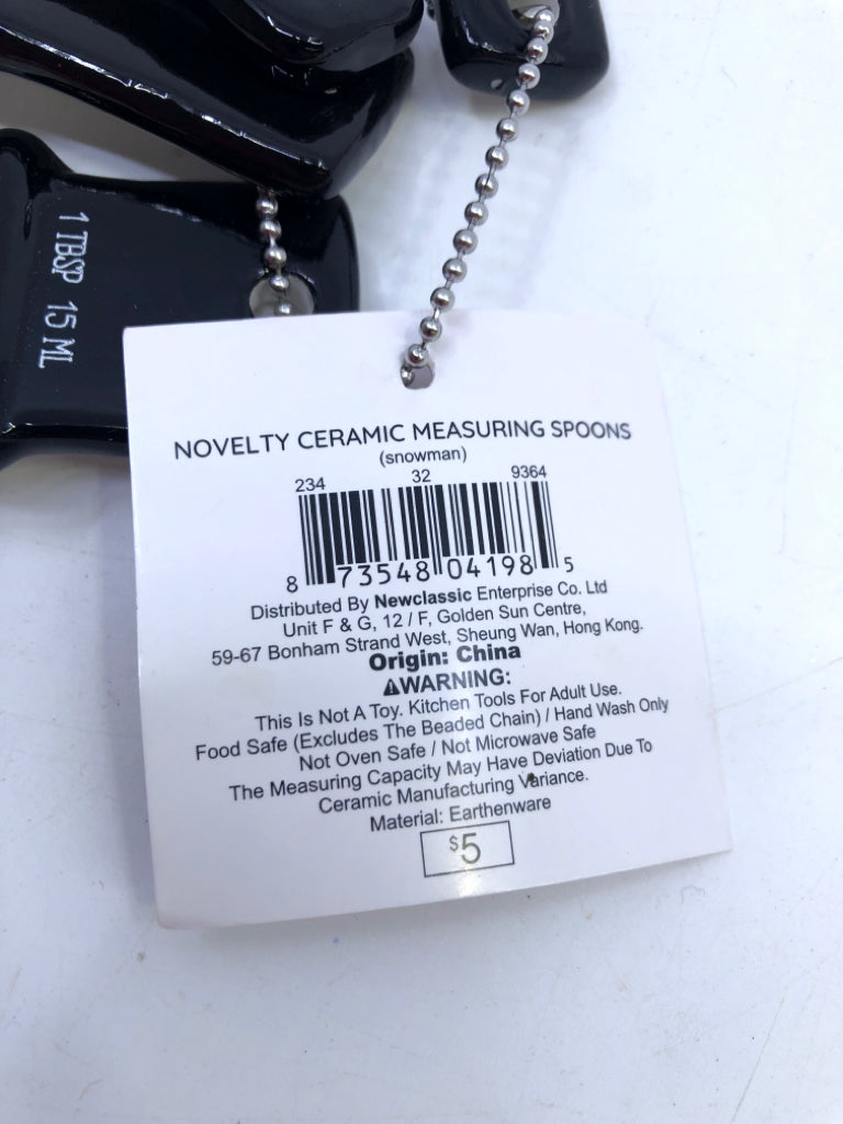 NWT SNOWMAN MEASURING SPOONS.