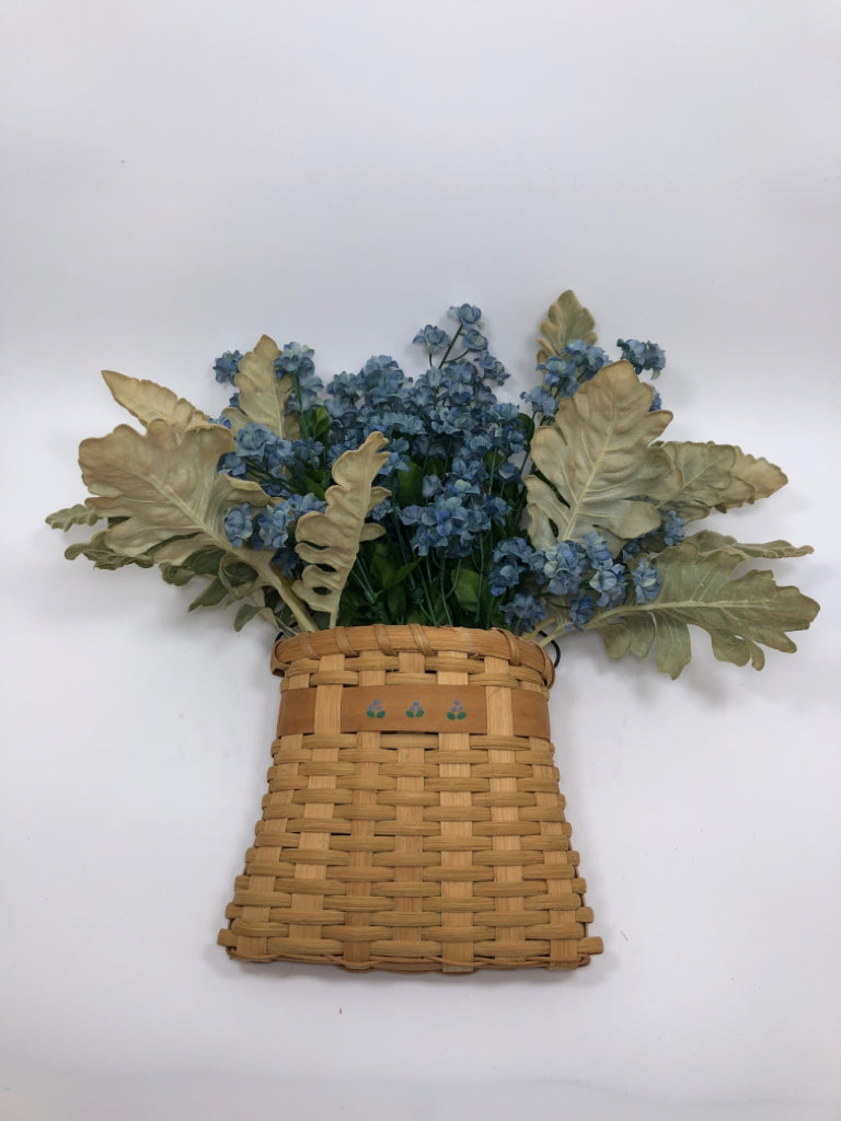 FAUX BLUE FLORALS IN WOVEN BASKET WALL POCKET.