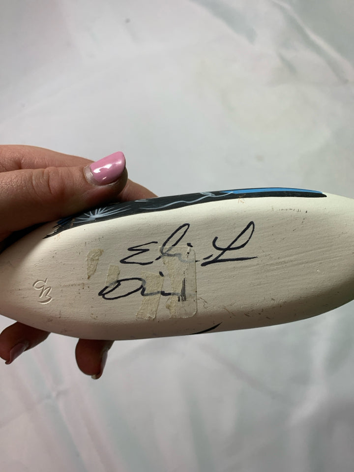 BLACK AND BLUE OVAL CANOE.