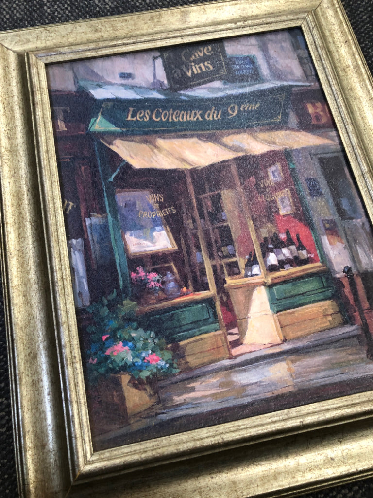 CAFE PAINTING IN GOLD FRAME.