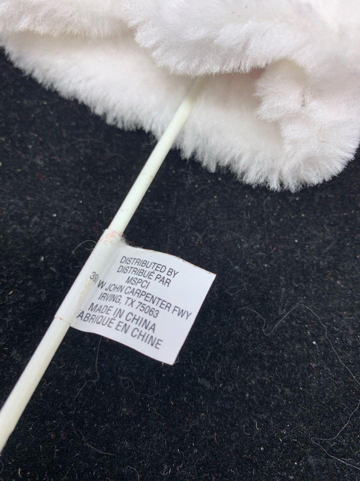 SANTA COAT ON A STICK.