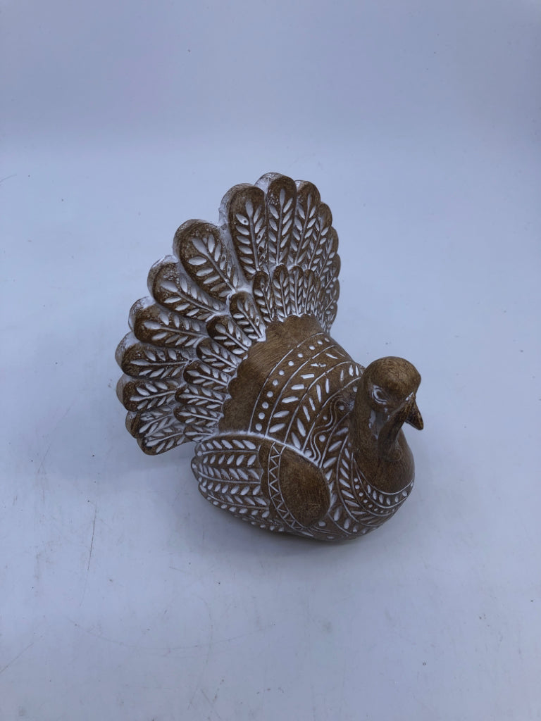 WHITE CARVED TURKEY.