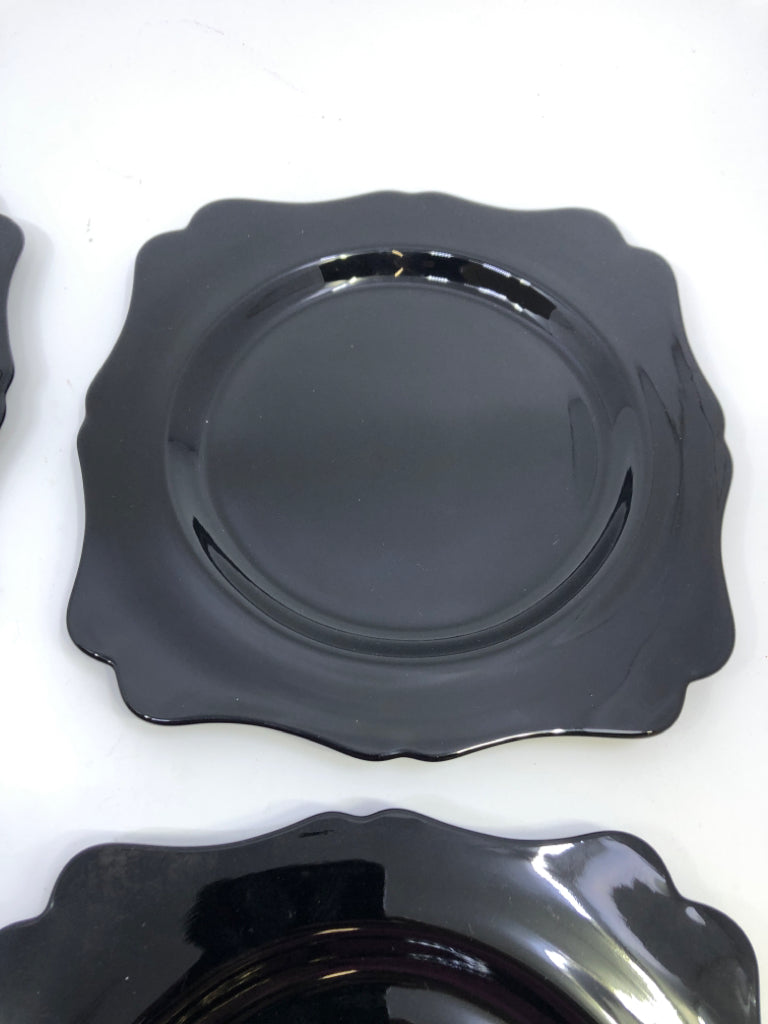 4 GLASS BLACK APPETIZER PLATES.