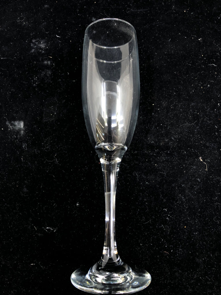 4 CLEAR CHAMPAGNE GLASSES.
