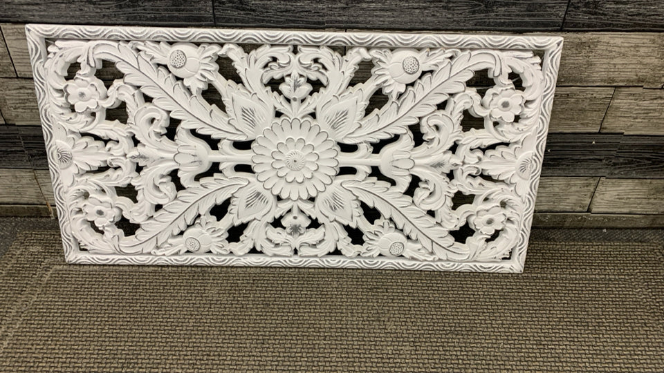DISTRESSED WHITE CARVED WOODEN FLORAL PANEL.