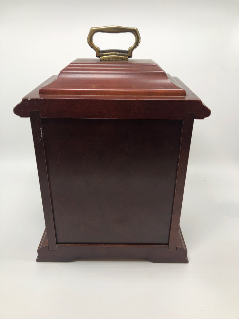 SLIGH CLOCK W/ 3 DRAWERS INSIDE.