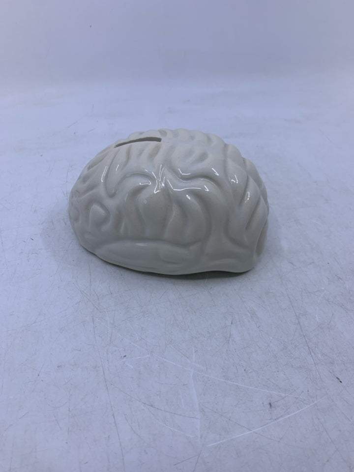 CREAM CERAMIC BRAIN COIN BANK.