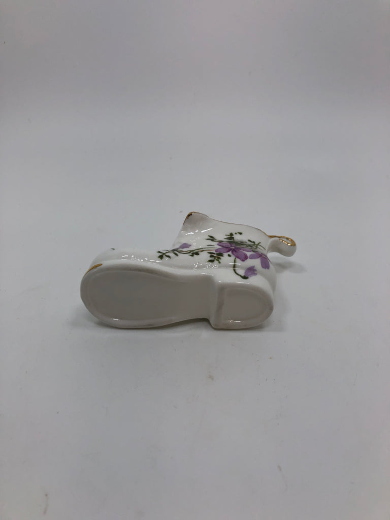 MINI PORCELAIN SHOE W/PURPLE FLOWERS AND GOLD TRIM.