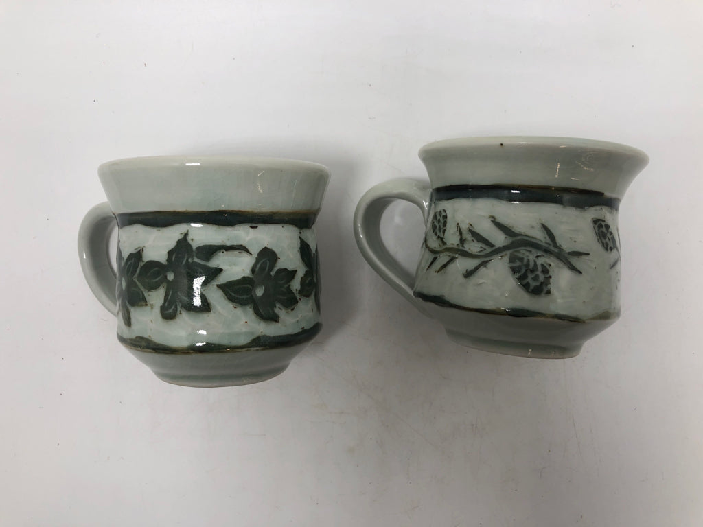 2 FLOWER/ACORN ETCHED DEMITASSE MUGS.