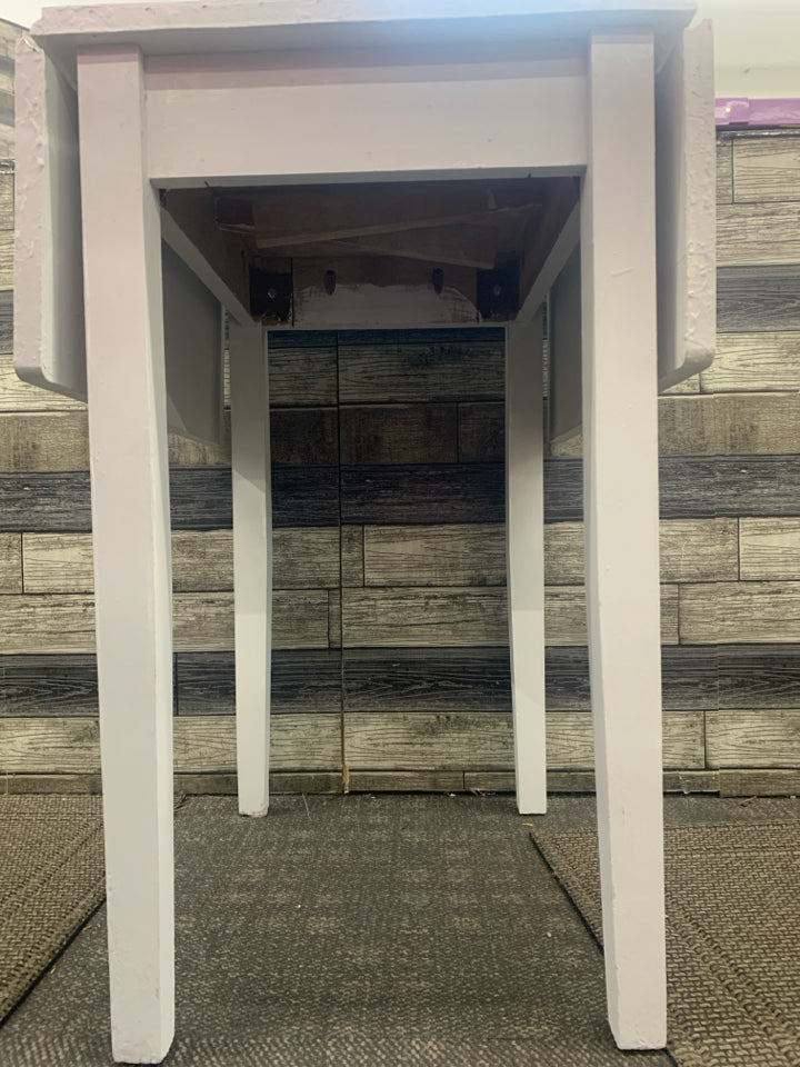 WHITE PAINTED FOLDABLE WING TABLE.