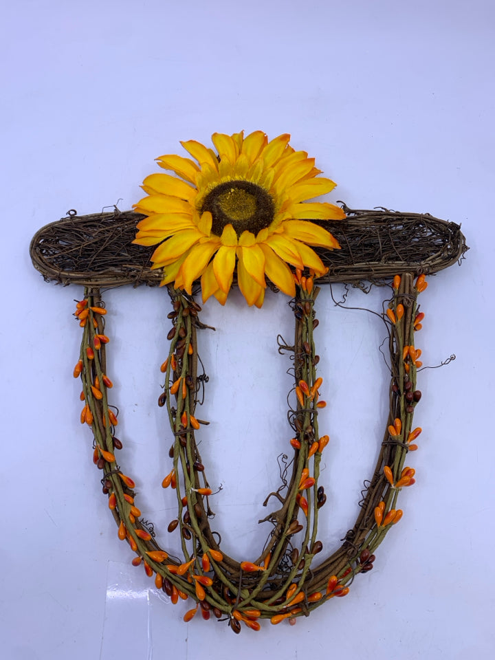 TWIG ACORN WITH SUNFLOWER WALL HANGING.