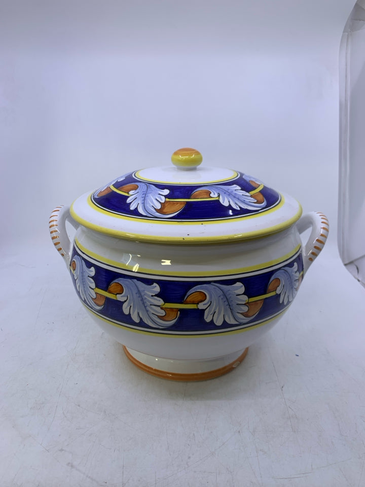 WHITE W/ COBALT BLUE BANDS ORANGE/ YELLOW LEAVES.