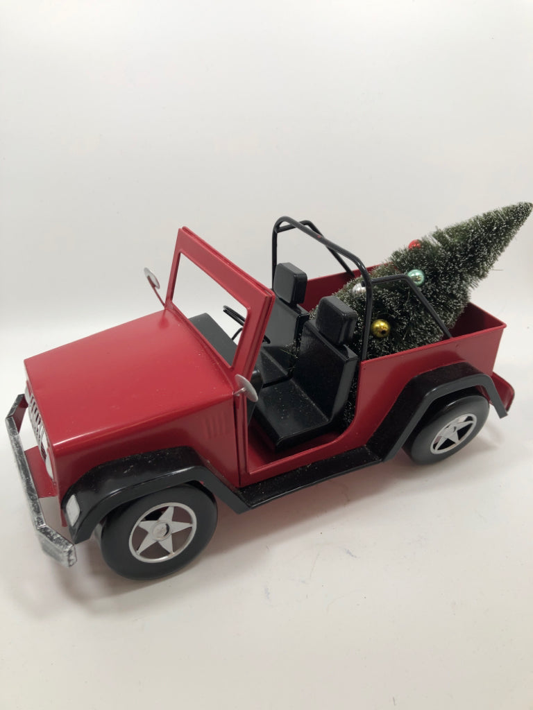 RED METAL JEEP W/CHRISTMAS TREE.
