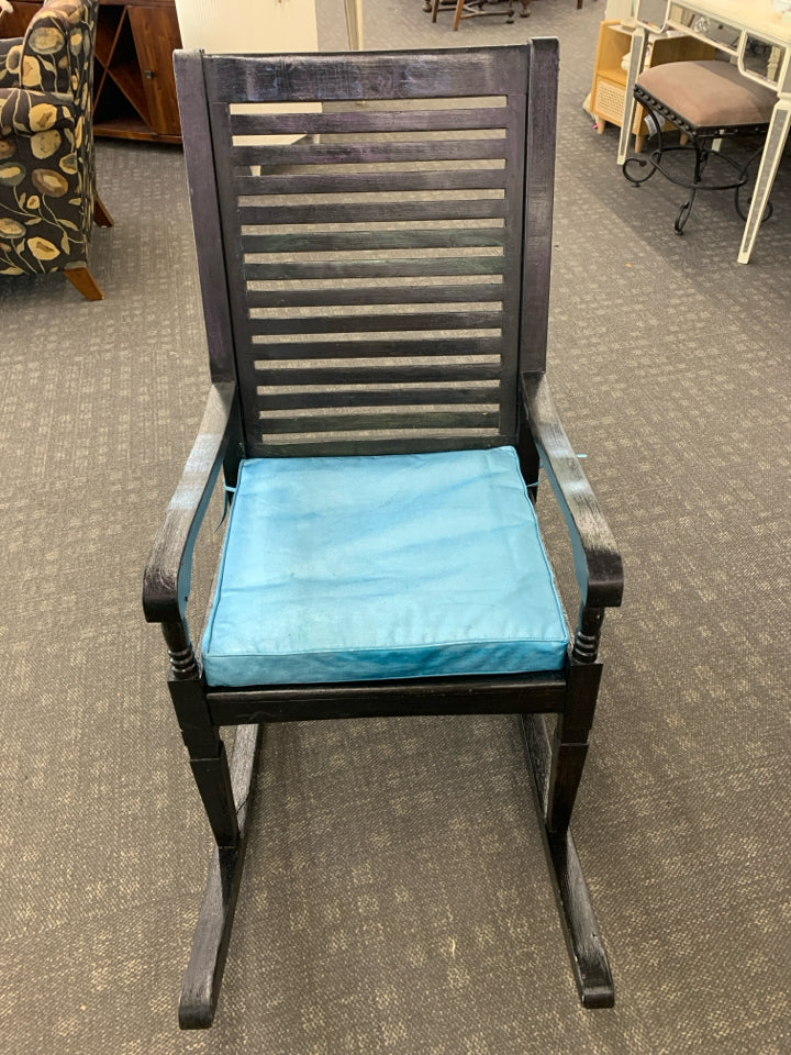 BLACK ROCKING CHAIR W TEAL CUSHION.