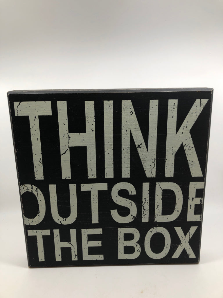 THINK OUTSIDE THE BOX BLOCK SIGN.