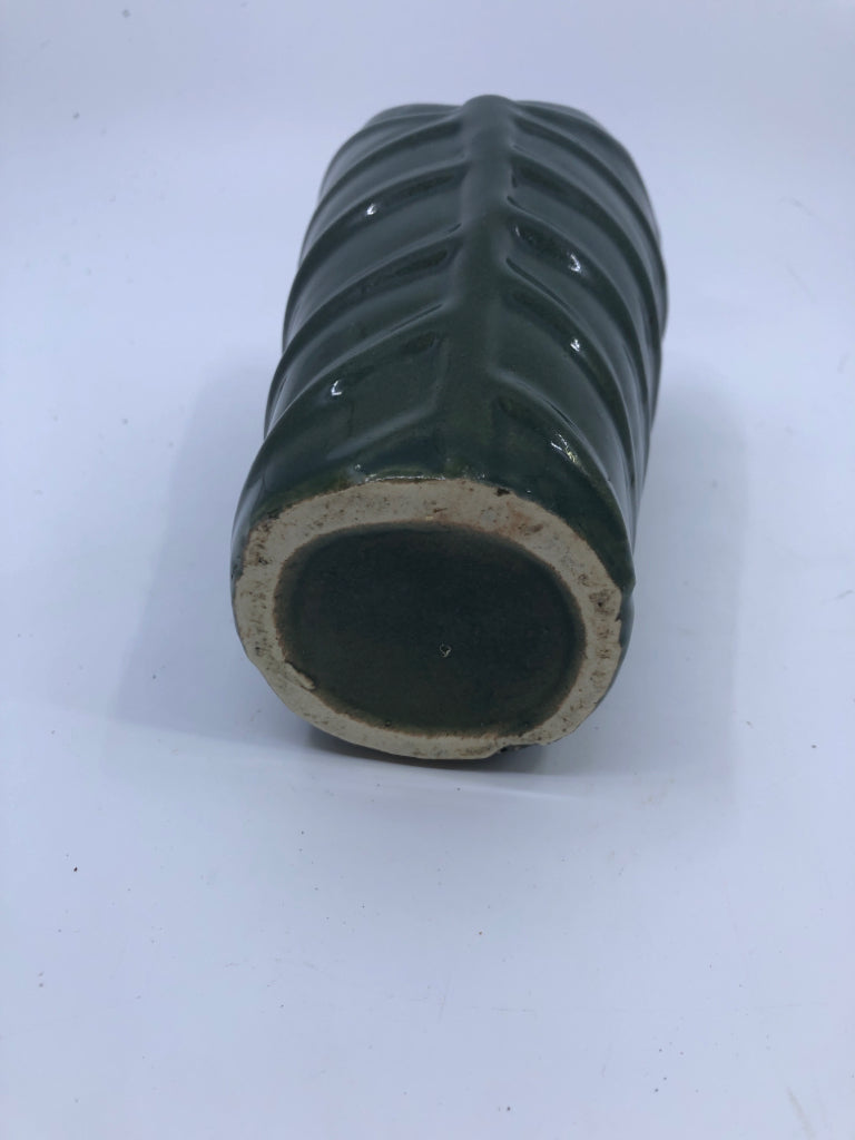 GREEN RIBBED CERAMIC VASE.