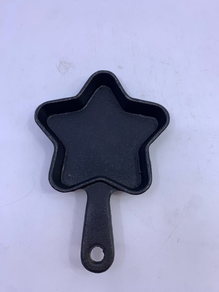 MINI STAR SHAPED CAST IRON SKILLET.