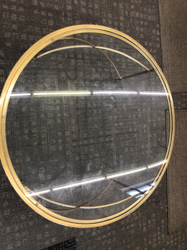 ROUND GLASS TOP COFFEE TABLE.