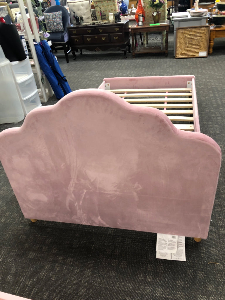 UPHOLSTERED PINK VELVET TWIN BED W/CLOUD-SHAPED HEADBOARD.