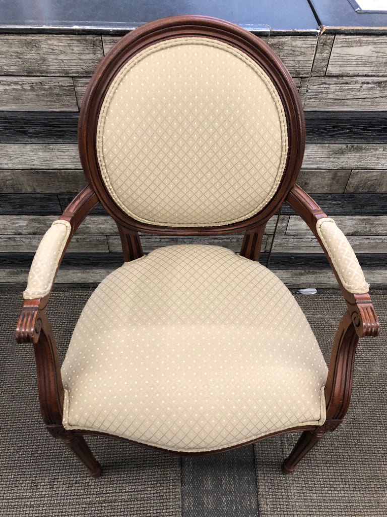 VTG WOODEN CHAIR W/GREEN DOTTED PATTERN.