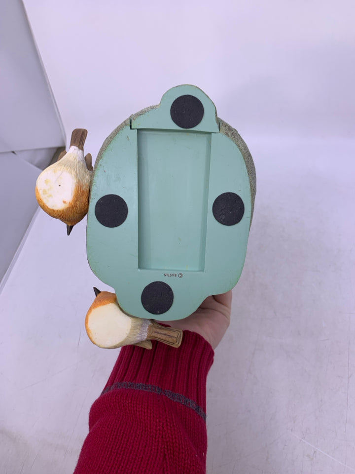 RESIN GREEN RABBIT W/ SECRET KEY SLOT ON BOTTOM.