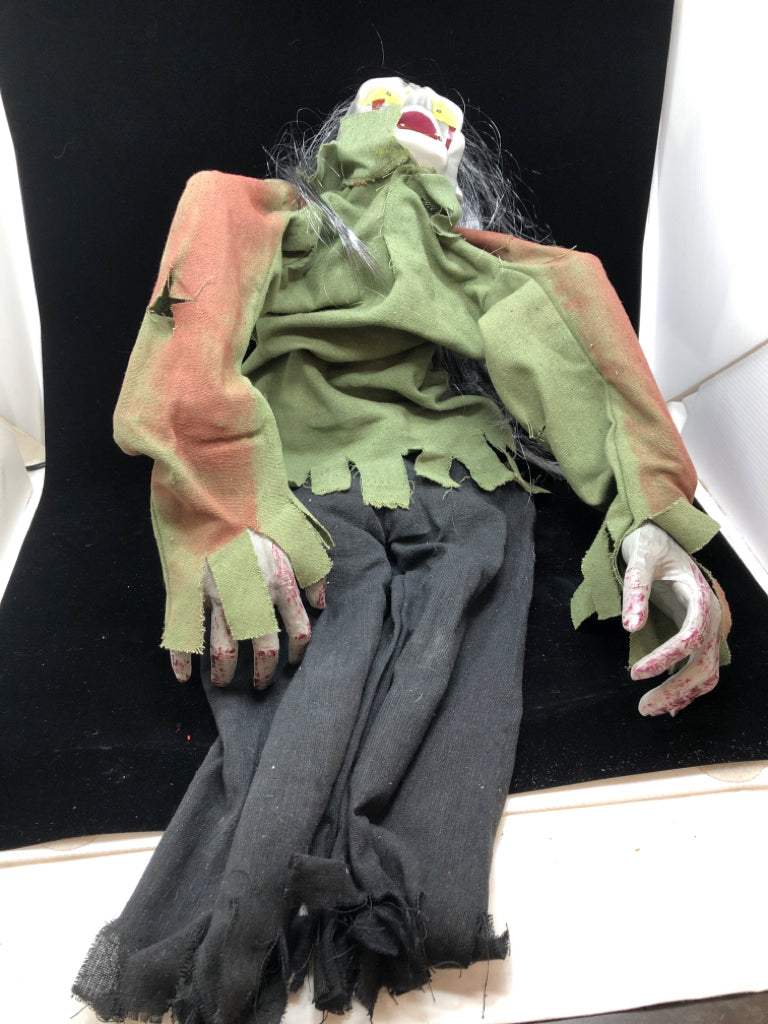 PLASTIC ZOMBIE HALLOWEEN DECOR.