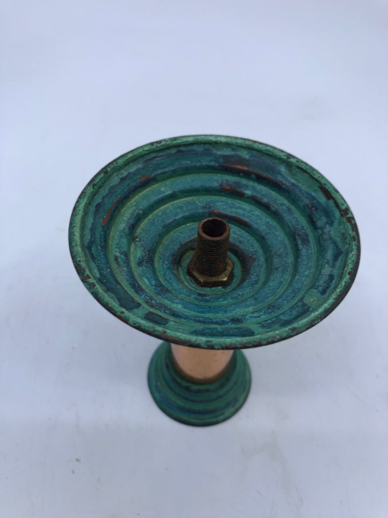 3 COPPER CANDLE HOLDERS W CANDLES.