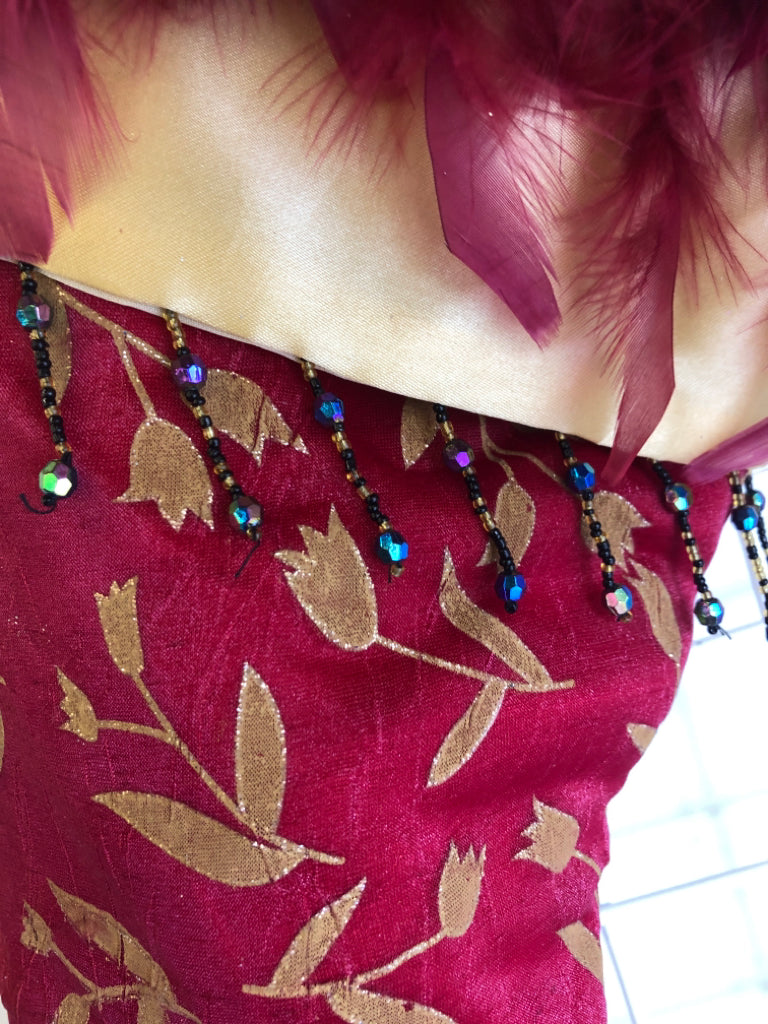 RED BOOT STOCKING W/FEATHERS.