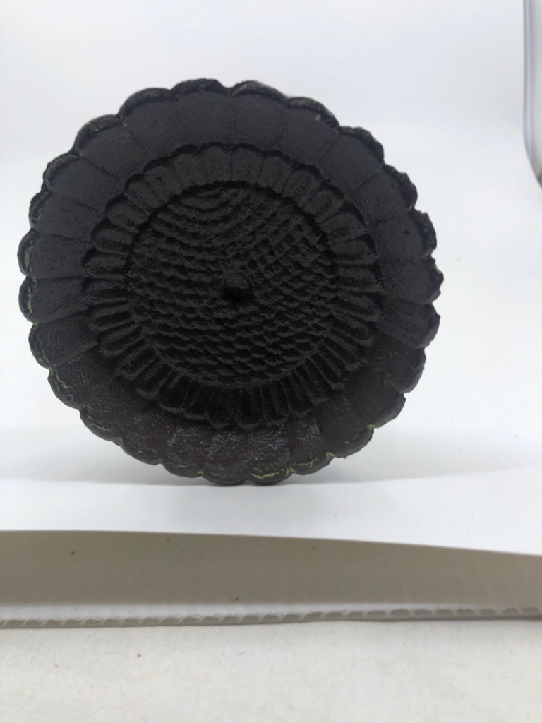 TALL GRAY METAL CUTOUT CANDLE HOLDER.