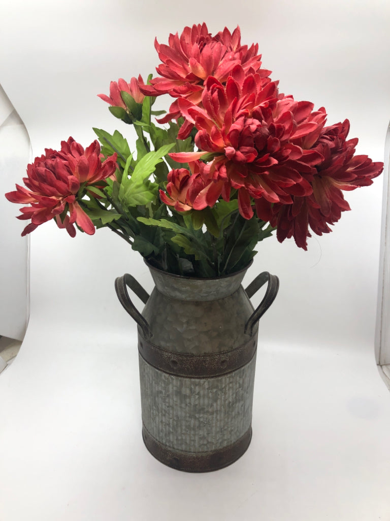 FAUX RED FLORALS IN GALVANIZED MILK JUG.
