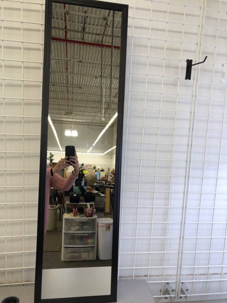 THIN FULL LENGTH MIRROR W/BLACK TRIM.
